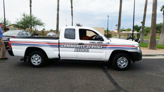 Colorful labeling clearly identifies a  Community Services Patrol truck.